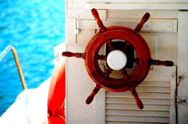 A traditional wooden ship helm